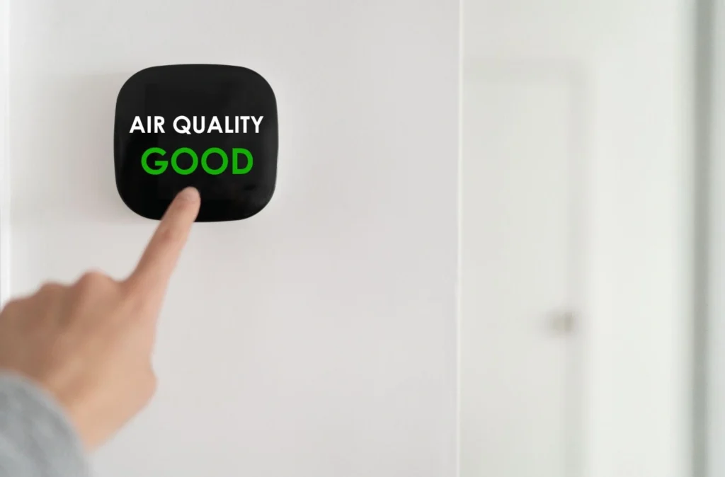 Device displaying "Air Quality Good" rating.